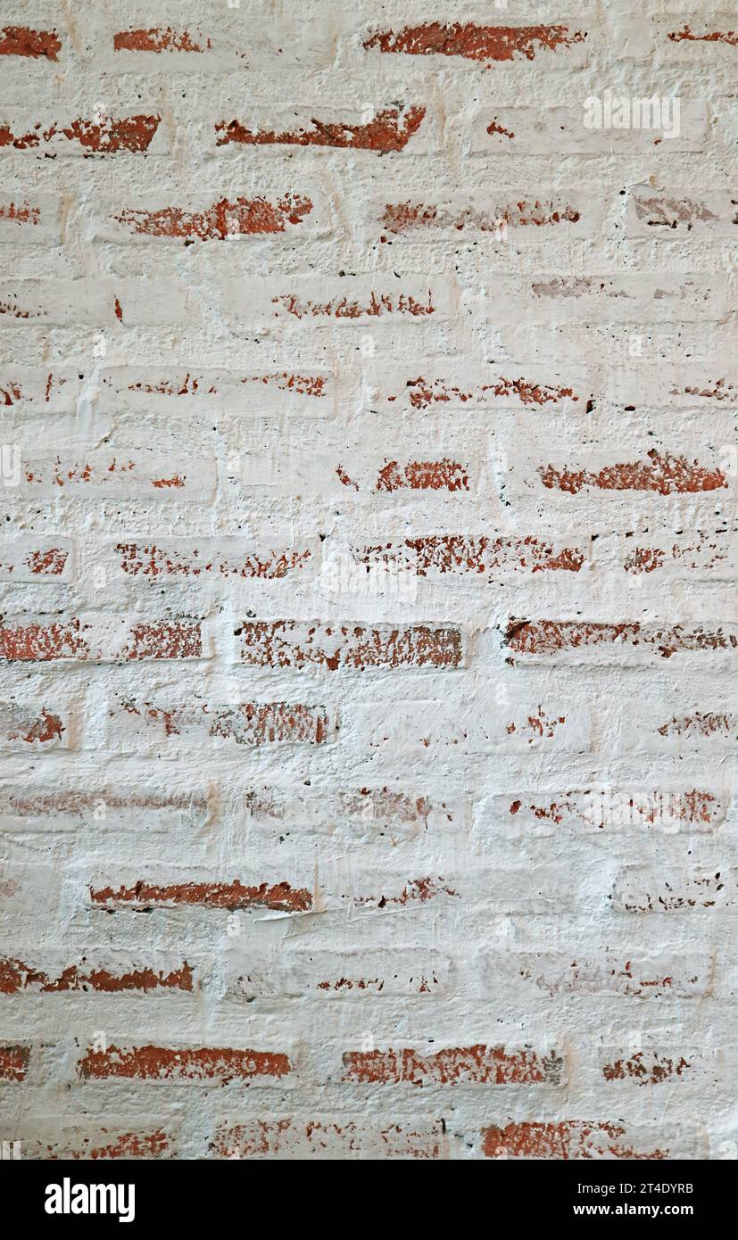Front View of Weathered Painted Brick Wall Stock Photo
