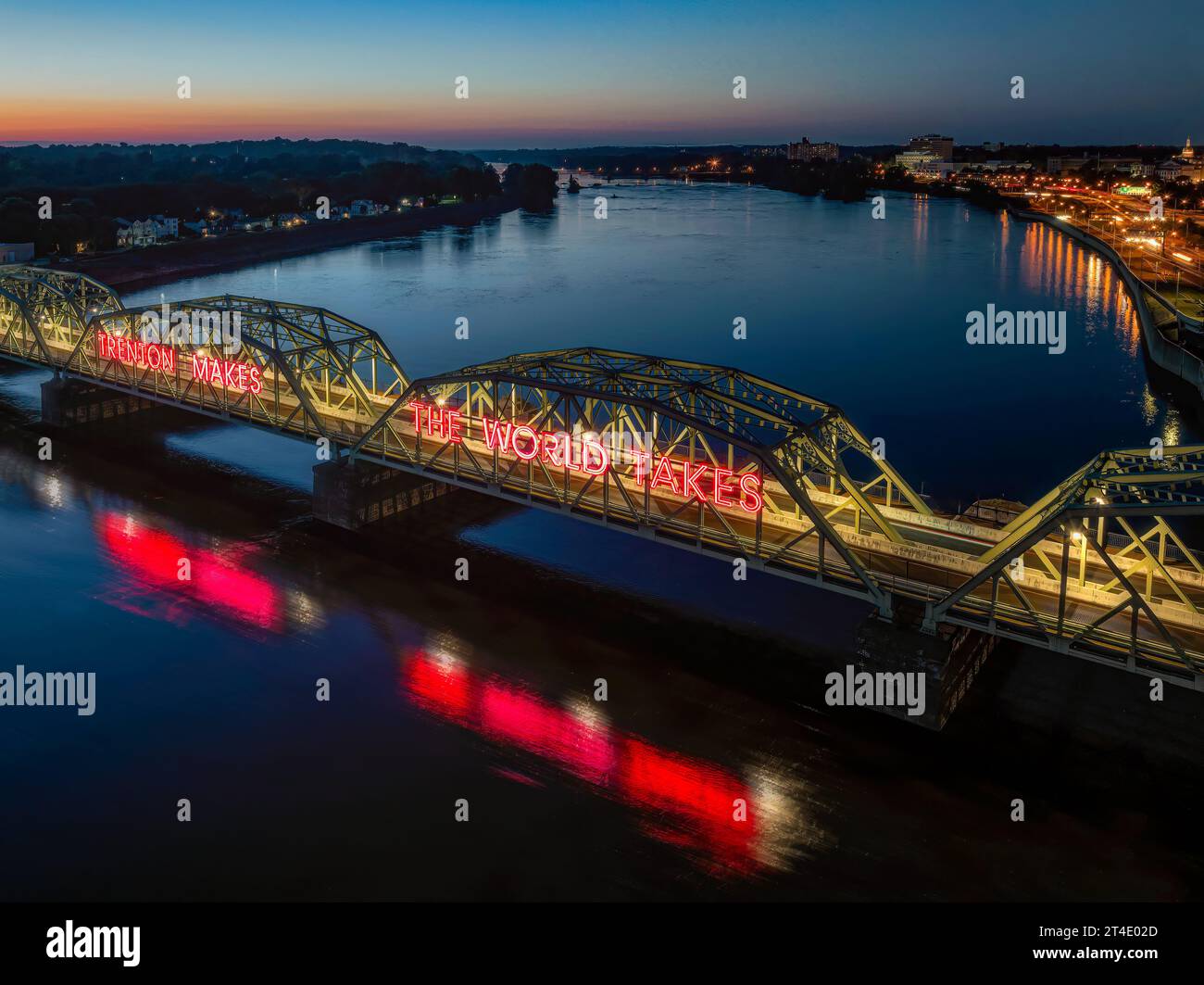Trenton Makes The World Takes - Aerial view of the illuminated Lower Trenton Bridge during the blue hour of twilight. Stock Photo
