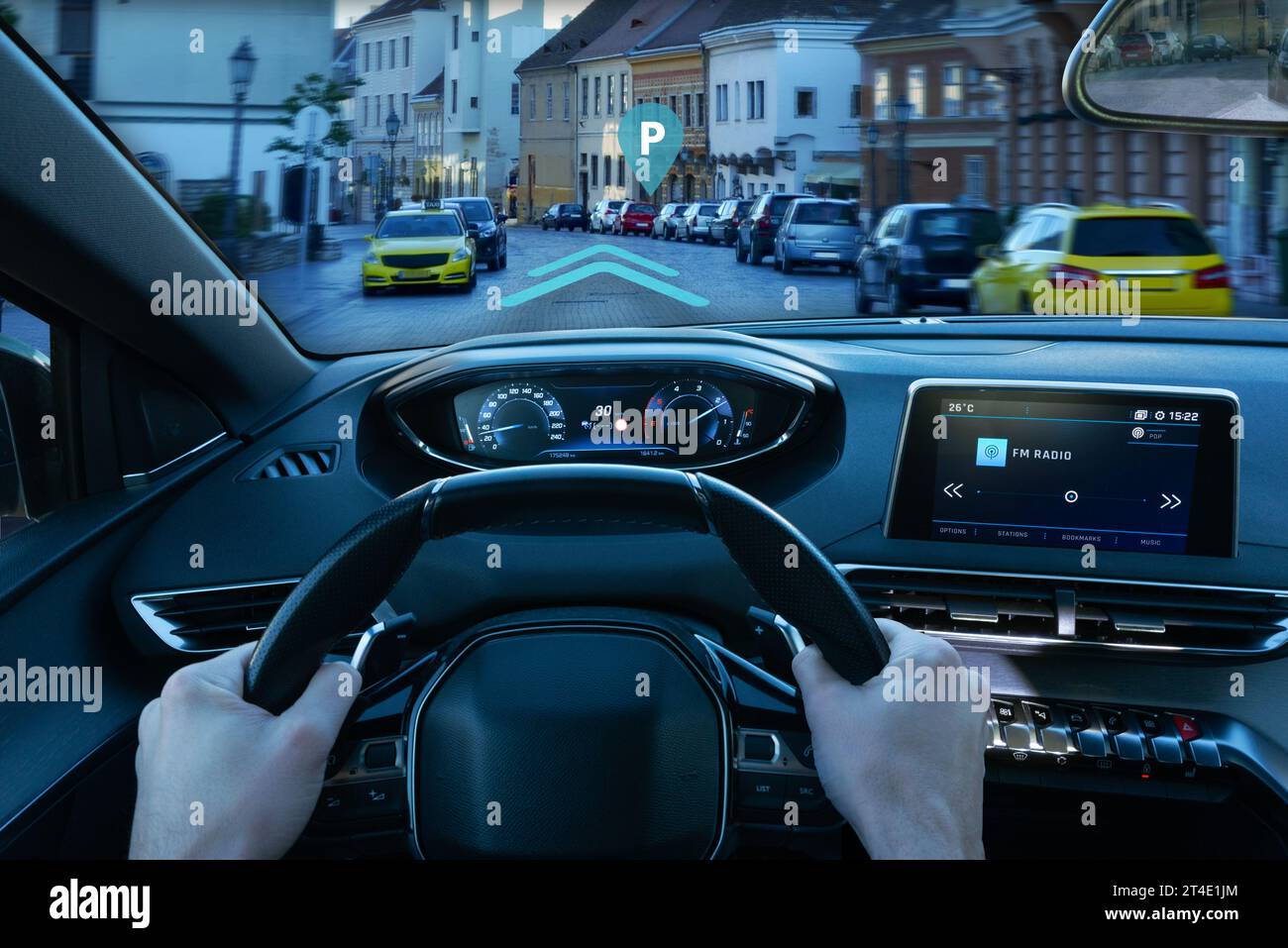 Inteligent car navigation to parking place concept. View from the driver's perspective Stock Photo