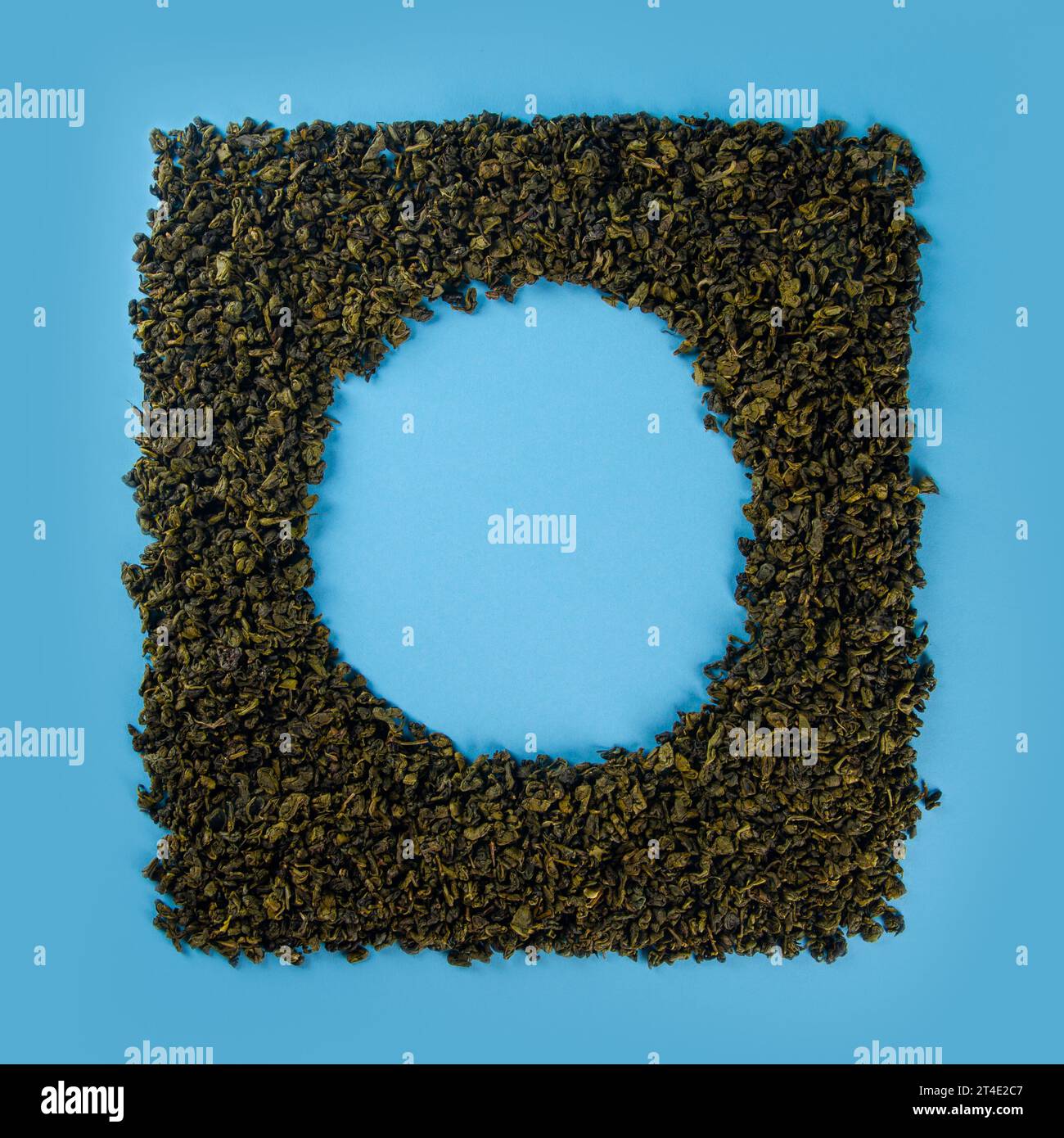 Mockup of dried tea leaves shaped in square Frame isolated on plain ...