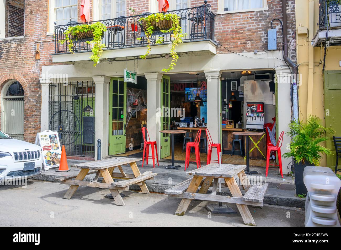 NEW ORLEANS, LA, USA - OCTOBER 22, 2023: Front of Pig Out Nola Barbecue Restaurant in the French Quarter Stock Photo