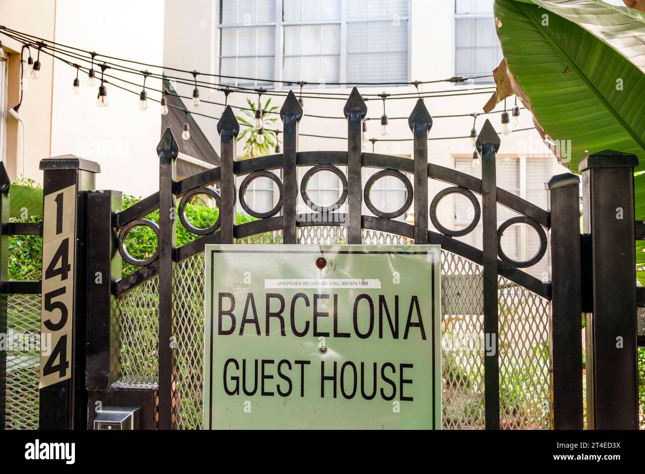 Miami Beach Florida,outside exterior,building front entrance hotel,The Barcelona Guesthouse guest house sign gate,hotels motels businesses Stock Photo