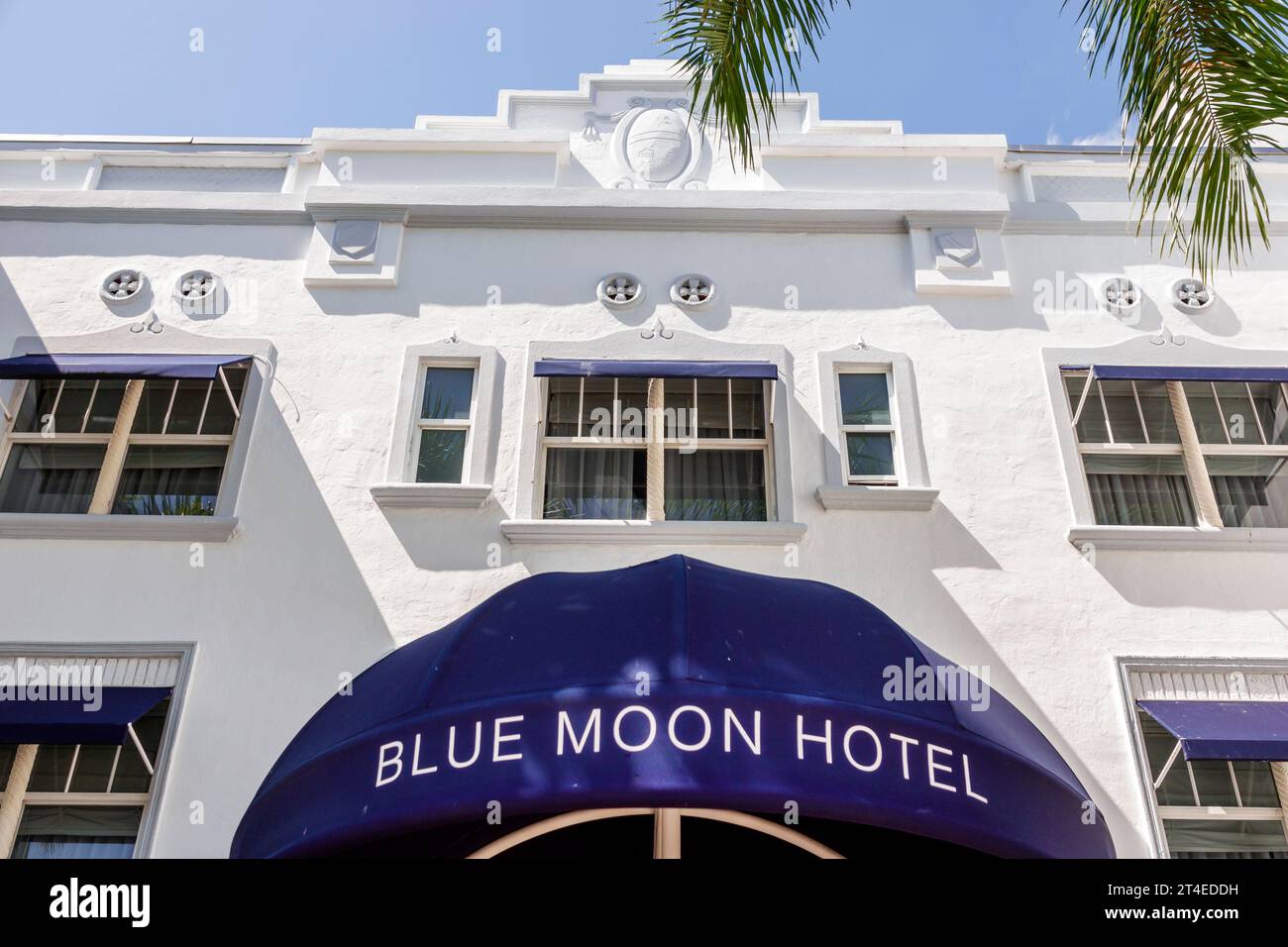 Miami Beach Florida,outside exterior,building front entrance hotel,Collins Avenue,Blue Moon Hotel sign awning,hotels motels businesses Stock Photo