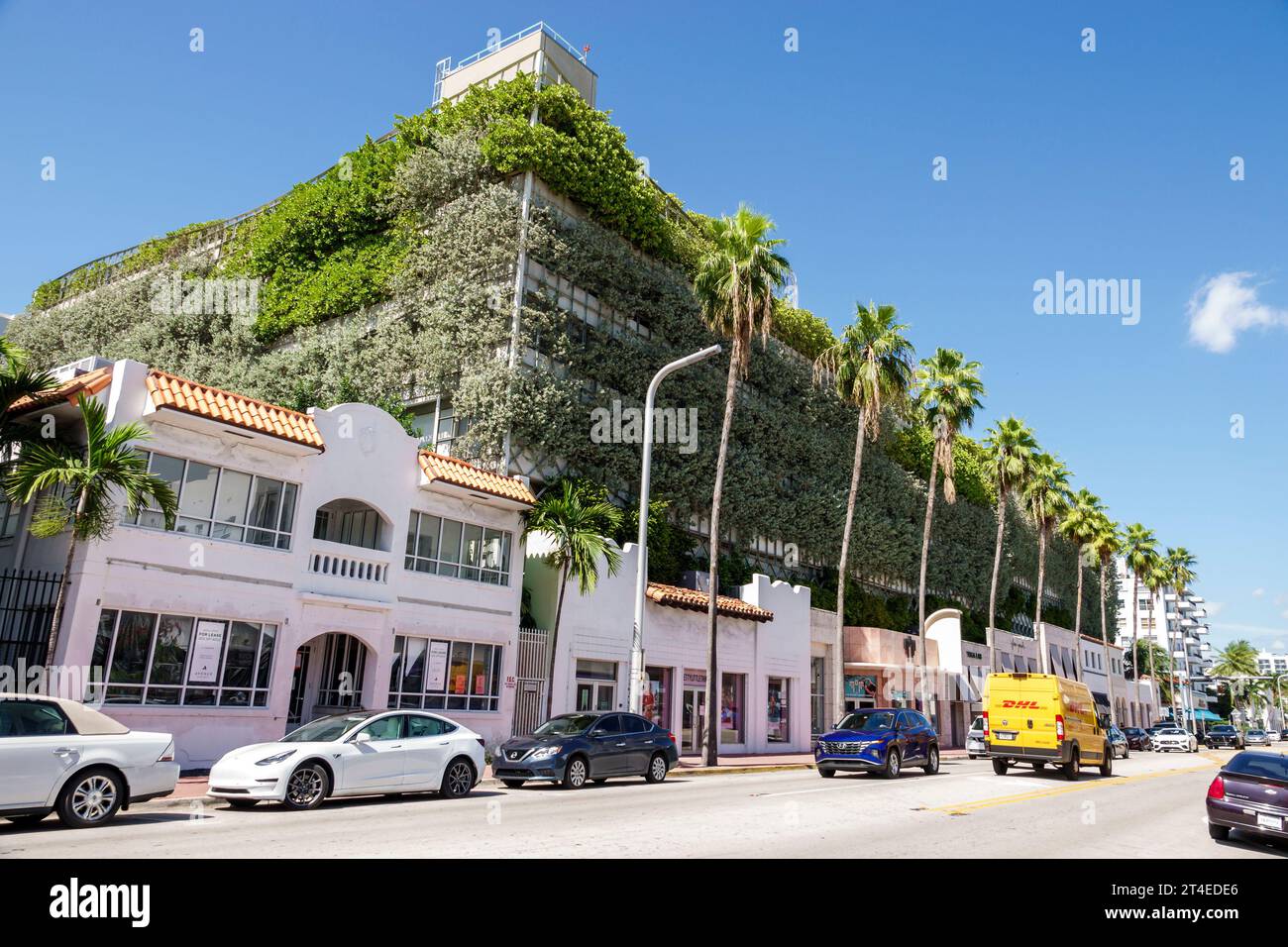 Miami Beach Florida,Collins Avenue,parking garage,Seventh 7th Street Parking  Garage,multi use building,shops,vertical vegetated wall,urban landscape,p  Stock Photo - Alamy