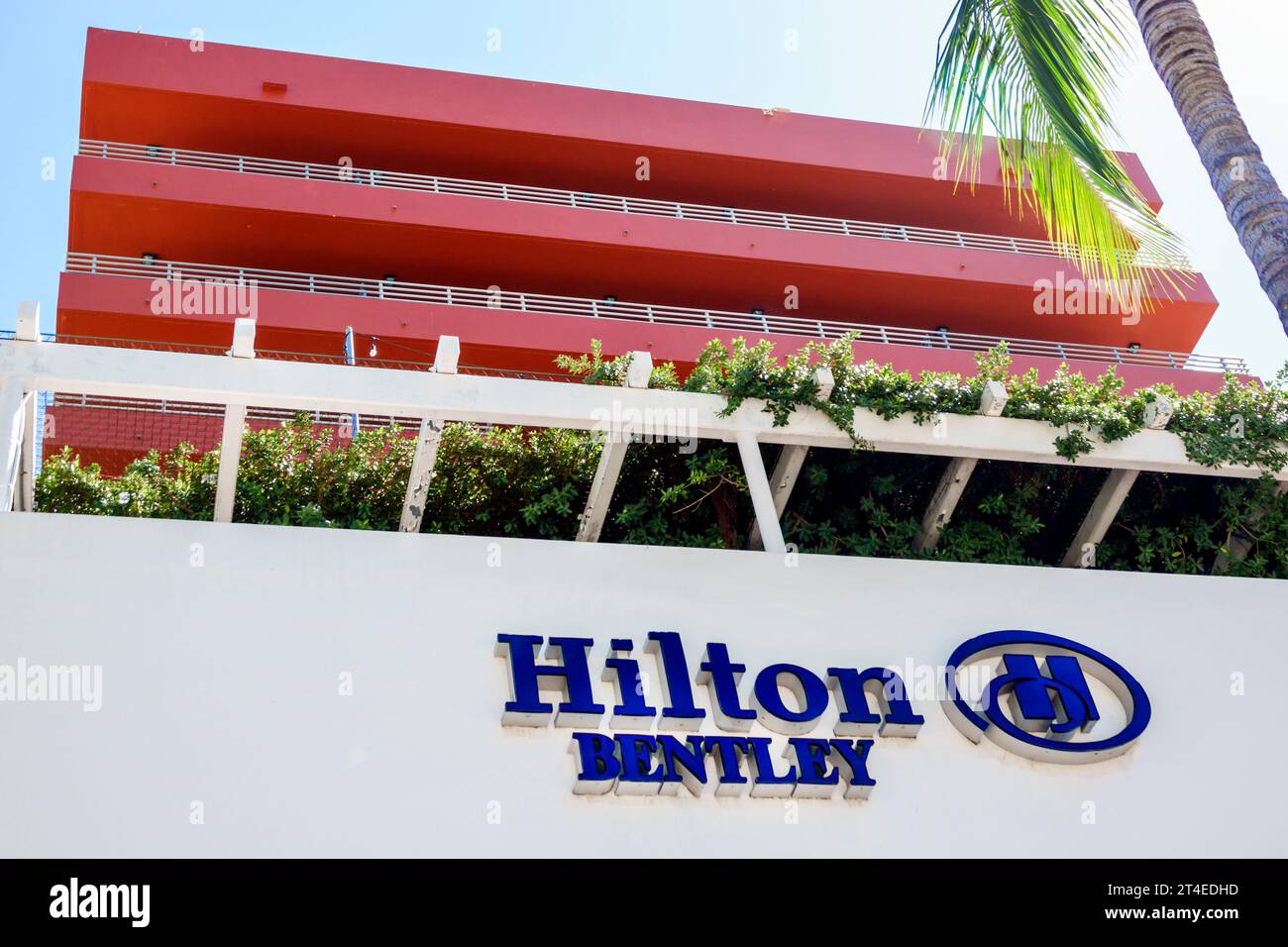 Miami Beach Florida,outside exterior,building front entrance hotel,Ocean Drive,Hilton Bentley Miami/South Beach sign,hotels motels businesses Stock Photo