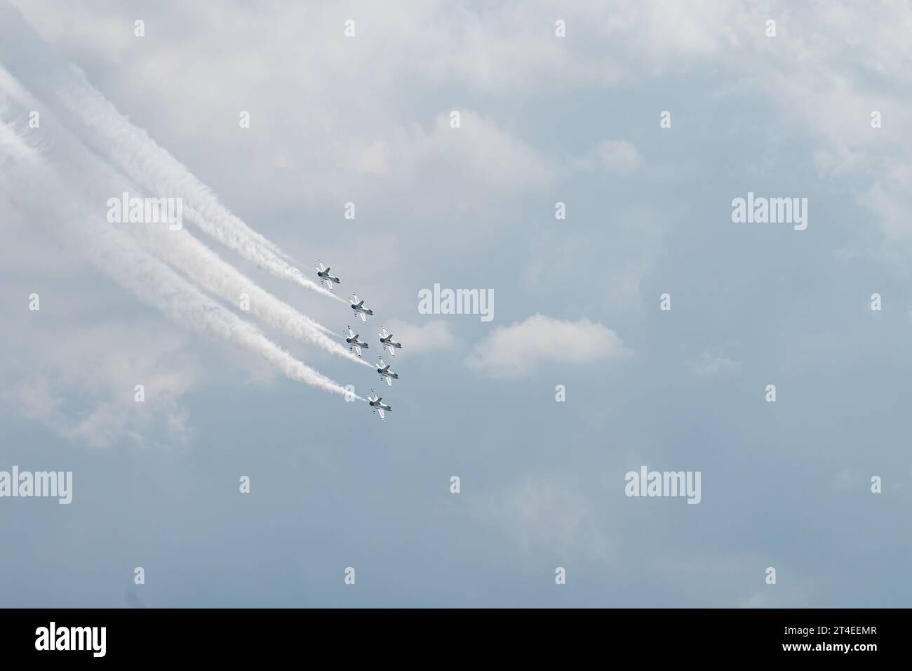 F-16 Fighter jets of the United States Air Force Official Air Demonstration Team The Thunderbirds in flight over Grand Traverse Bay near Traverse City Stock Photo