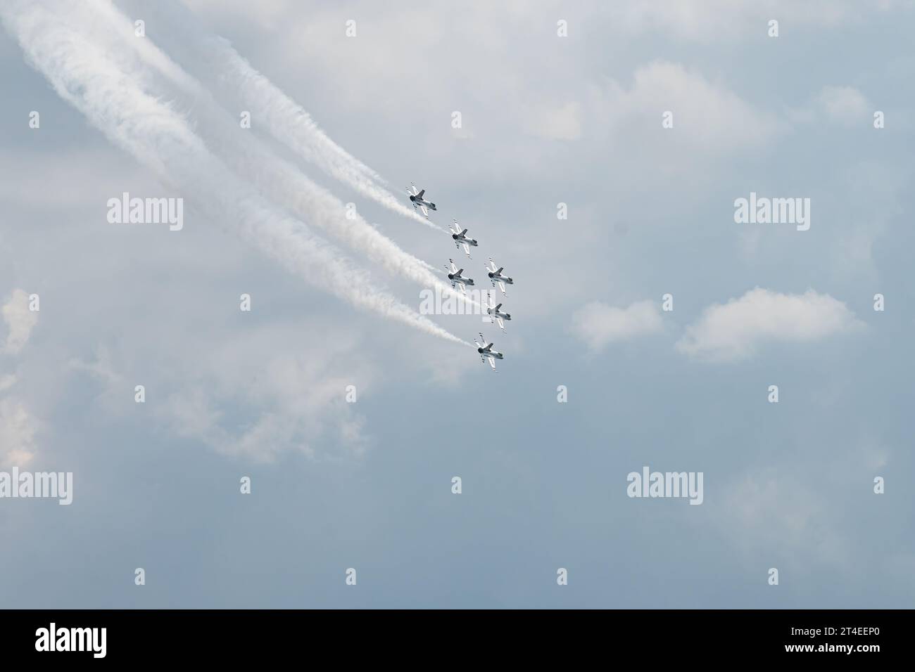 F-16 Fighter jets of the United States Air Force Official Air Demonstration Team The Thunderbirds in flight over Grand Traverse Bay near Traverse City Stock Photo