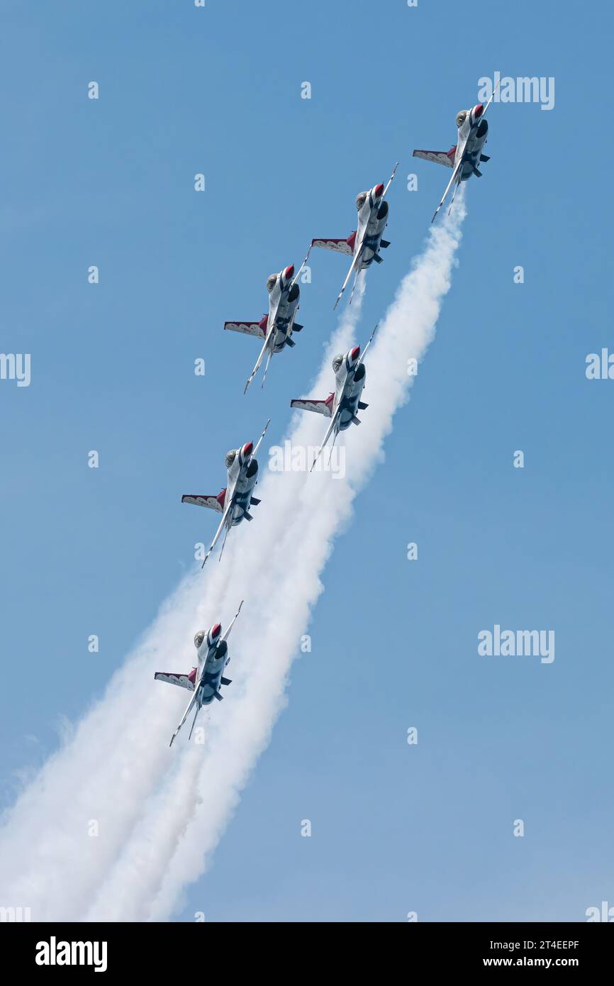 F-16 Fighter jets of the United States Air Force Official Air Demonstration Team The Thunderbirds in flight over Grand Traverse Bay near Traverse City Stock Photo