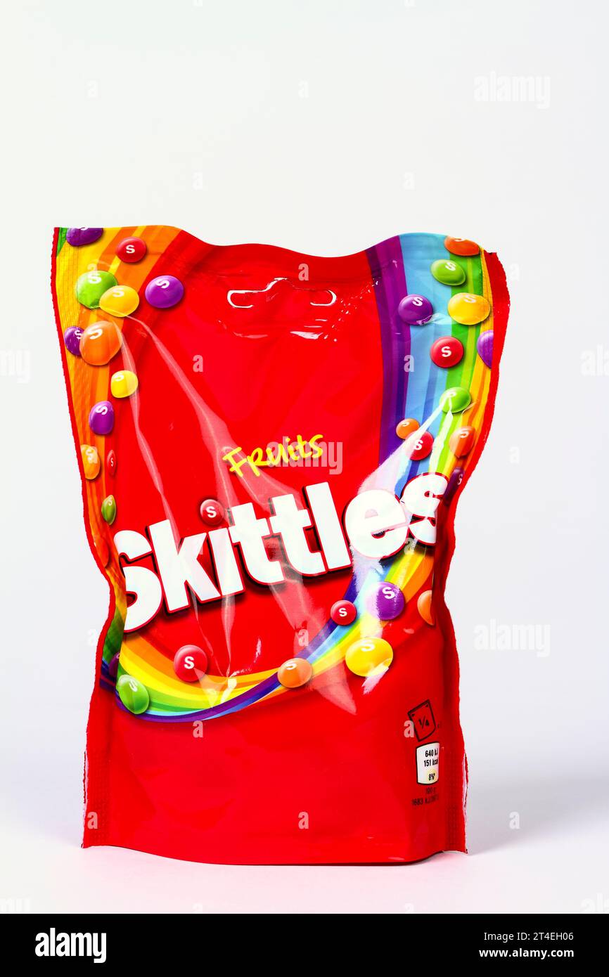 Packet of fruit Skittles candy sweets isolated on a white background