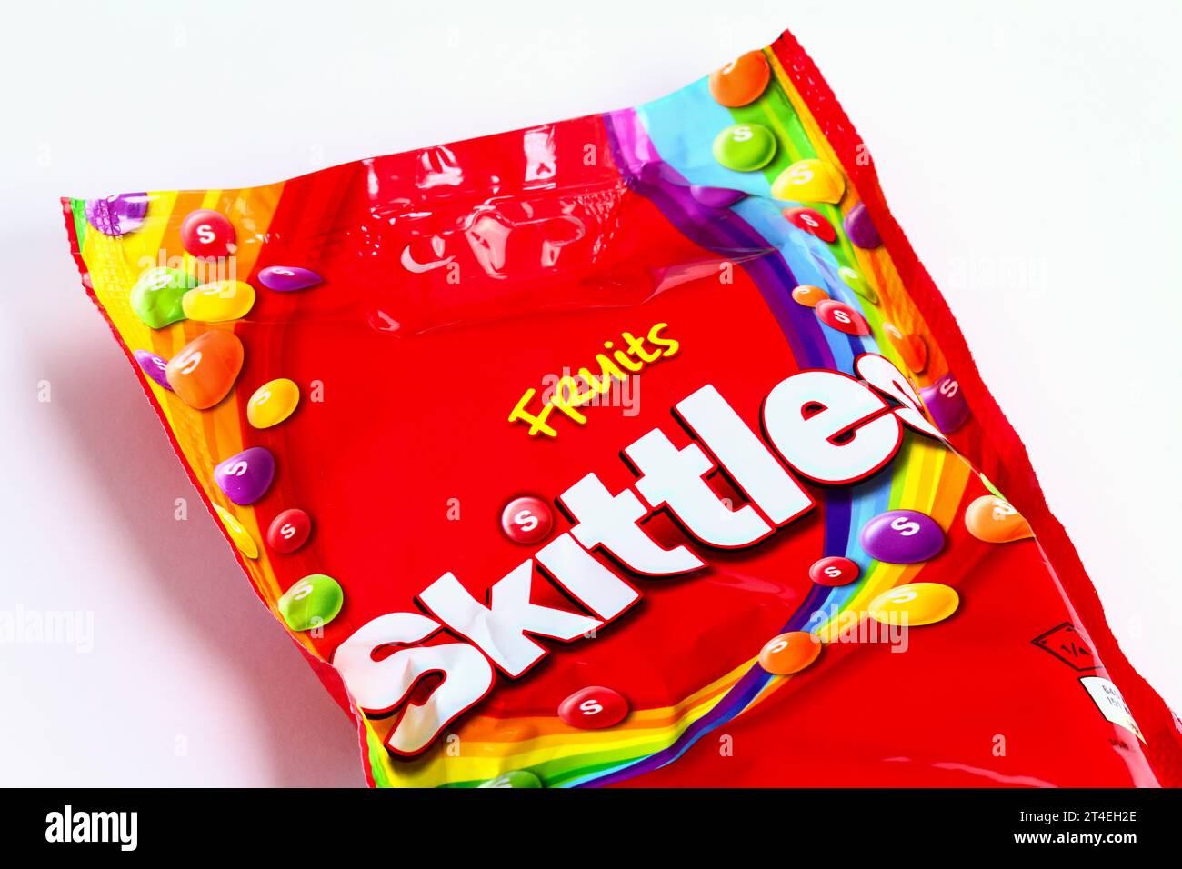 Packet of fruit Skittles candy sweets isolated on a white background