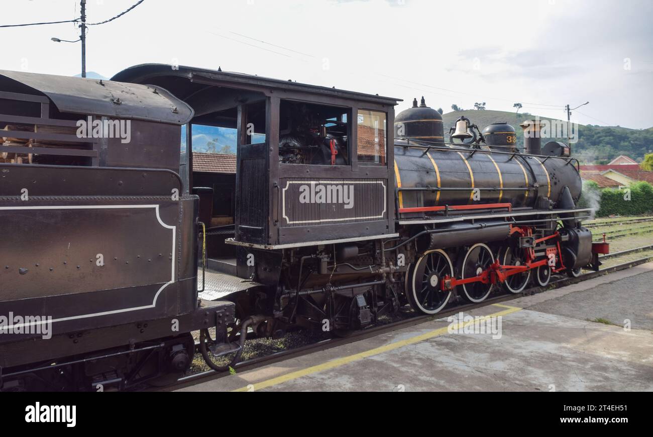 Steam train locomotive stopped at the station in the city of Passa Quatro, state of Minas Gerais, Brazil Stock Photo