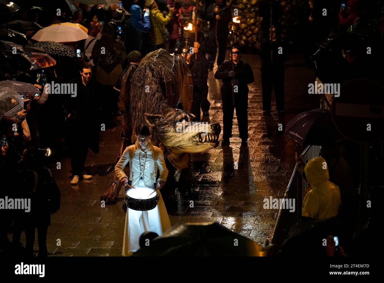 Crowds watch the Macnas Halloween Parade in Dublin city centre part of