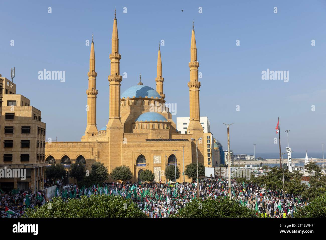 Beirut, Lebanon. 29th Oct, 2023. The Mohammad Al-Amin Mosque towers over people attending a demonstration by the Hamas party at Beirut, Lebanon on Oct. 29, 2023. Gaza Health Ministry said more than 8,000 Palestinians have been killed since Hamas attacked Israel on October 7. Tensions are high in Lebanon as skirmishes between Hezbollah and the Israeli military increase along the Lebanon-Israel border, and the possibility of war between the two looms on the horizon. The skirmishes have displaced at least 28,965 people in Lebanon according to International Organization for Migration. (Credit Im Stock Photo