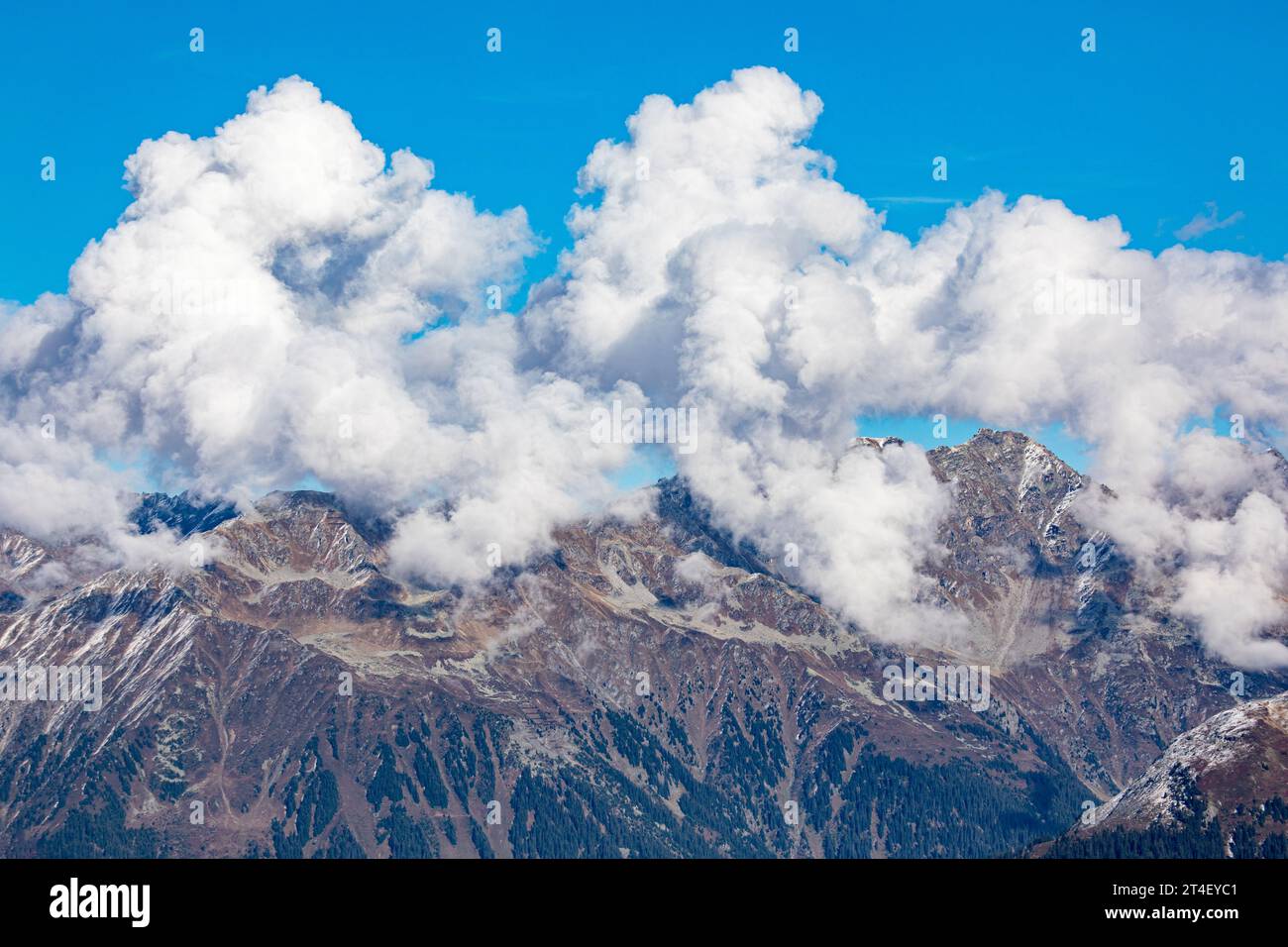Low hanging clouds in the swiss alps near Davos, Switzerland Stock Photo