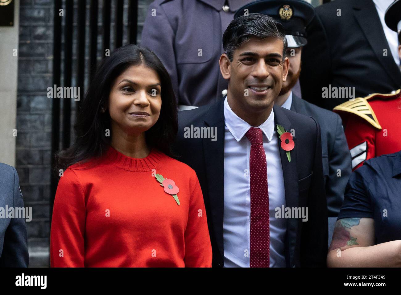 London, UK. 30th Oct, 2023. British Prime Minister Rishi Sunak and wife Akshata Murthy pose with fundraisers from The Royal British Legion's Poppy Appeal after purchasing his own poppy in Downing Street in London. Credit: SOPA Images Limited/Alamy Live News Stock Photo