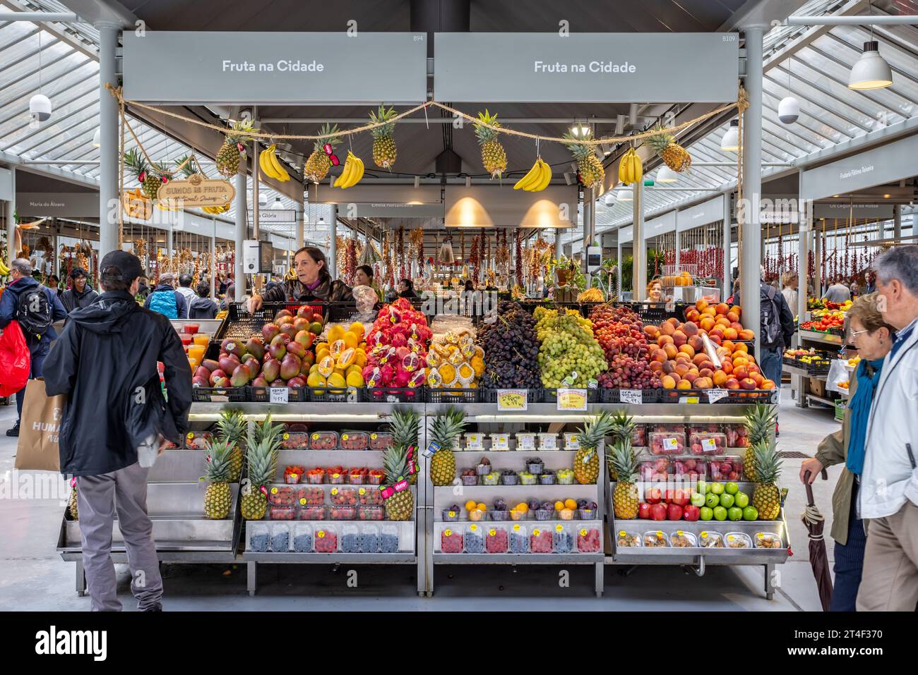 Display of colourful fruit on stall in Bolhao Market in Porto, Portugal on 19 October 2023 Stock Photo