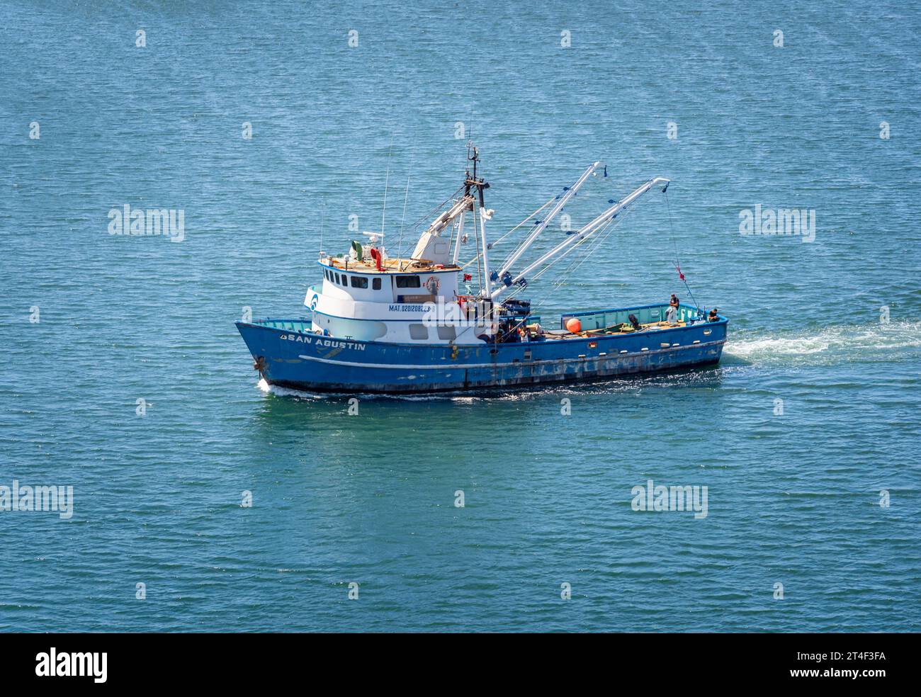 Ensenada, BC, Mexico – September 14, 2023: A commercial fishing boat traveling in the Port of Ensenada in Baja California, Mexico. Stock Photo