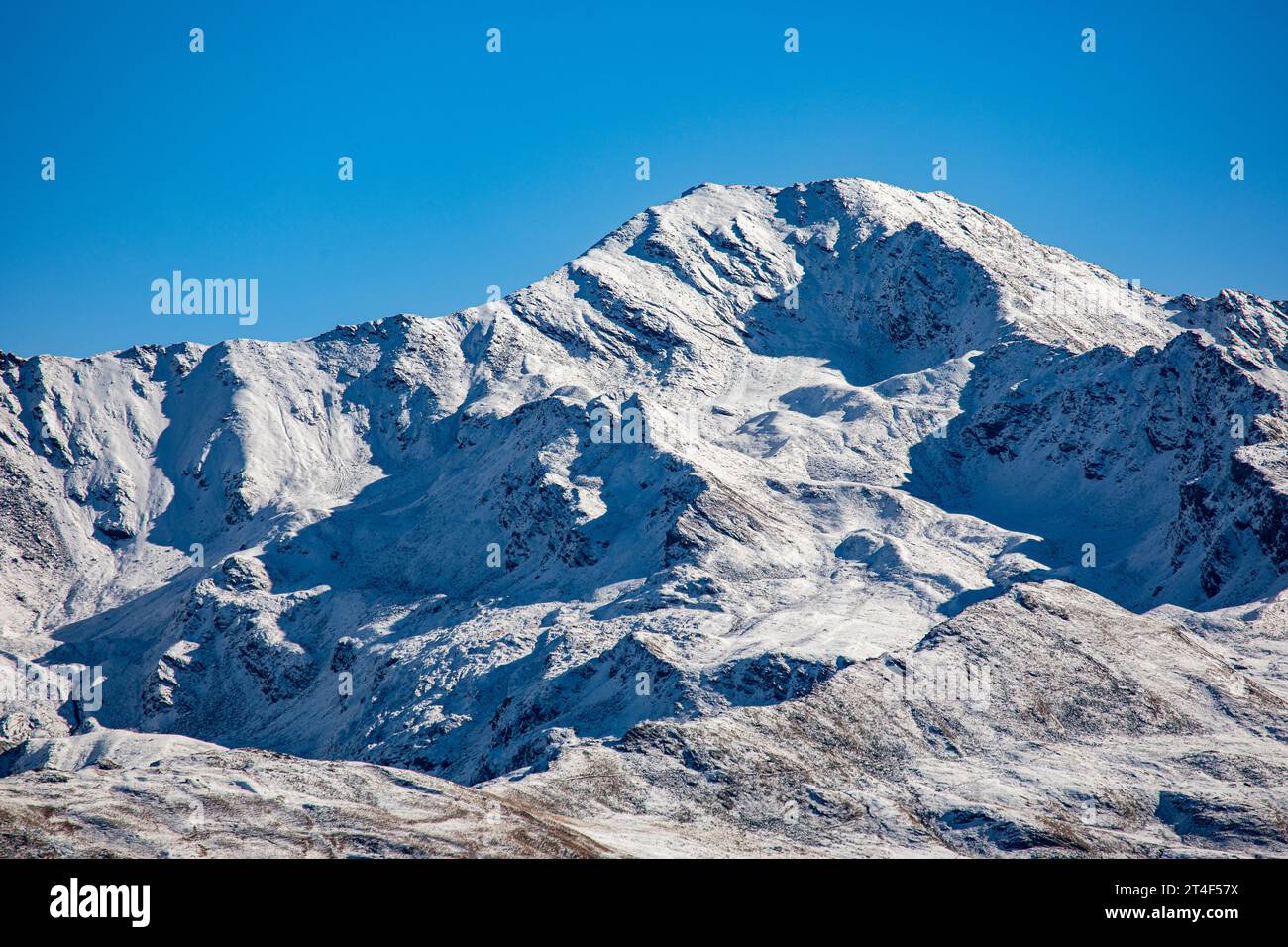 Snowy Mountain Pischahorn in Swiss Alps, Silvretta Alps, located east of Davos, in the Swiss canton of Graubuenden, Switzerland Stock Photo