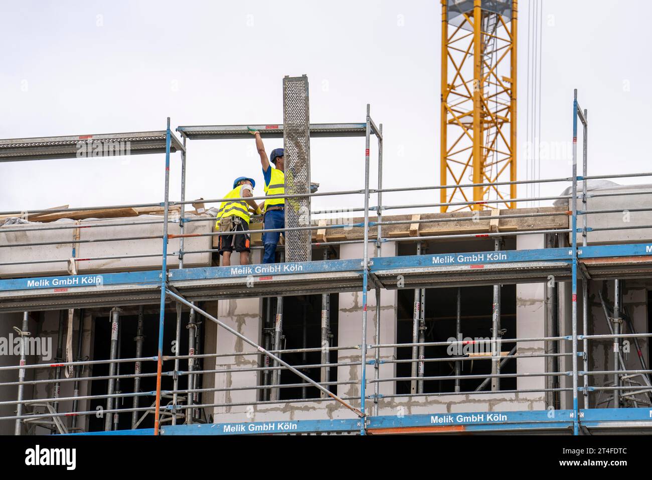 Major construction site, in Düsseldorf, condominium construction, shell construction, scaffolding, NRW, Germany Stock Photo