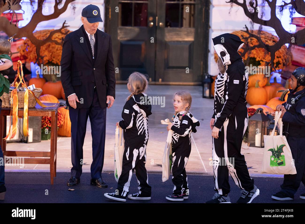 United States President Joe Biden welcomes Trick-or-Treaters to the White House in Washington, DC, October 30, 2023.Credit: Chris Kleponis/CNP/MediaPunch Stock Photo