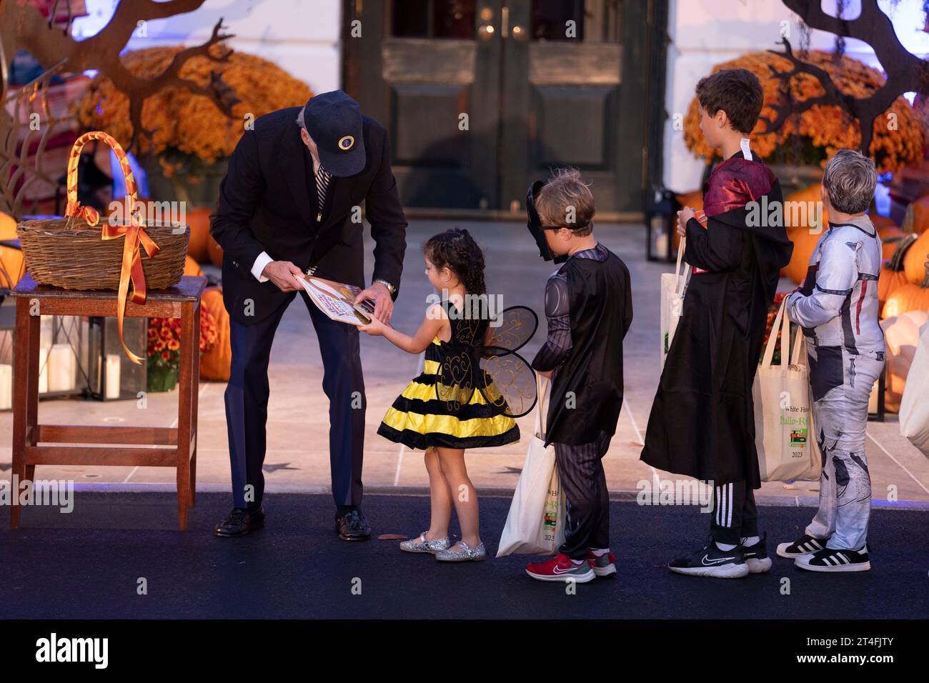 United States President Joe Biden Biden welcomes Trick-or-Treaters to the White House in Washington, DC, October 30, 2023.Credit: Chris Kleponis/CNP/MediaPunch Stock Photo