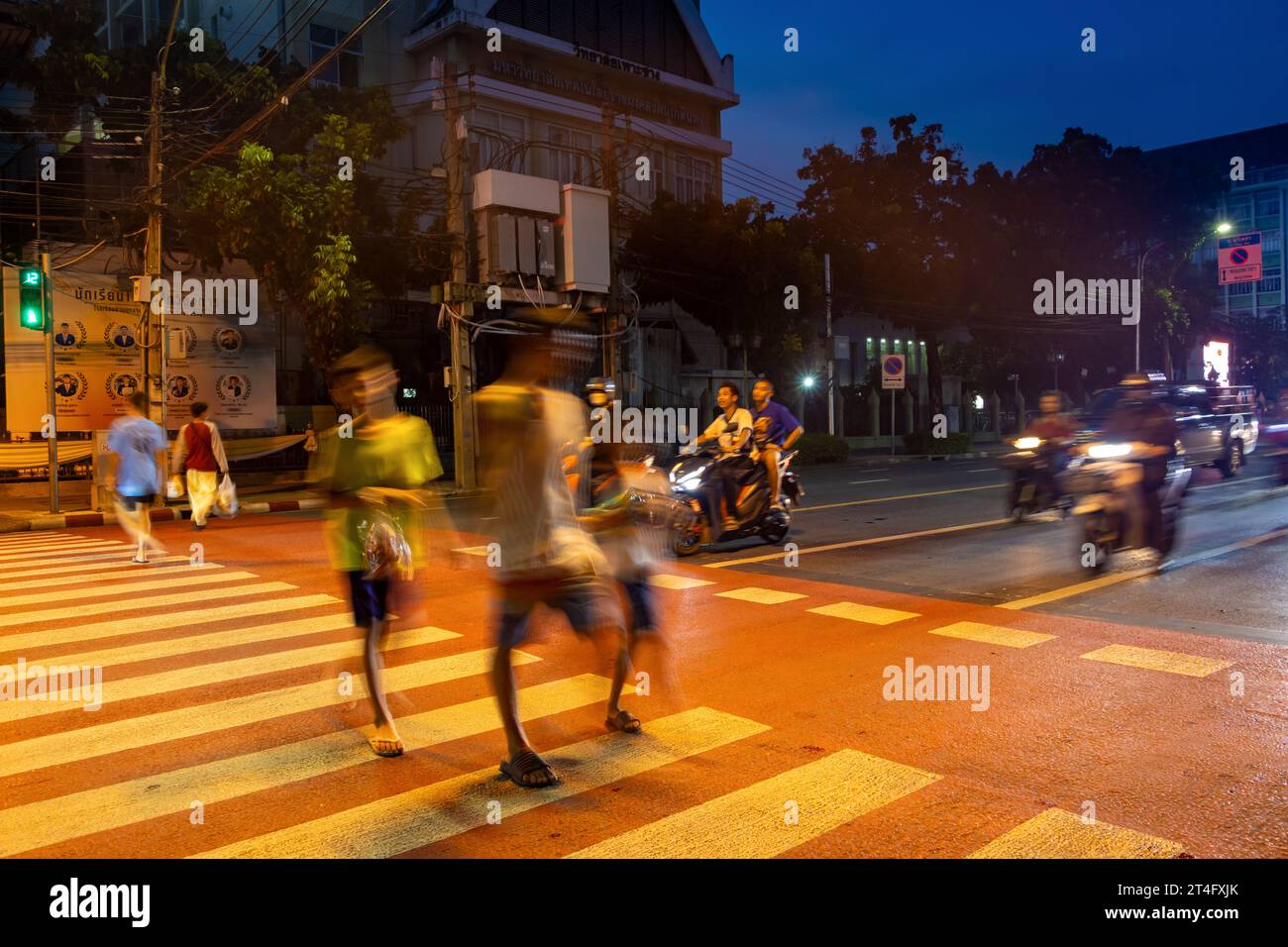 BANGKOK, THAILAND, OCT 28 2023, People walk on pedestrian zebra