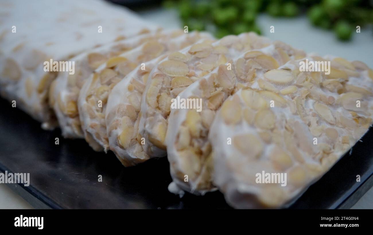 Tempe is fermented soybeans with a high protein content Stock Photo Alamy
