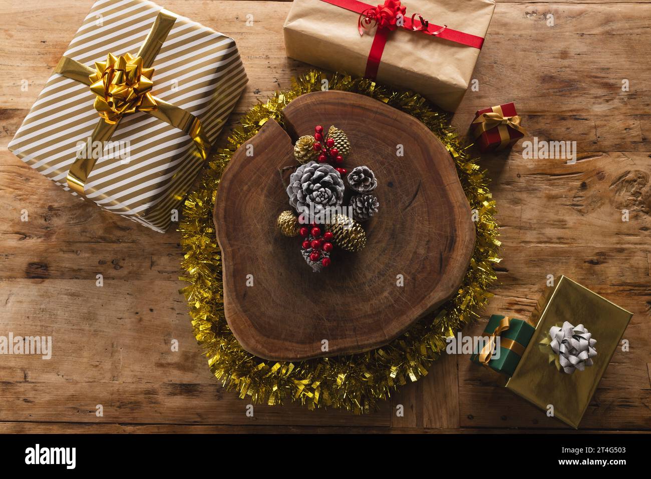 Beautiful christmas decorations and gifts on wooden countertop Stock Photo