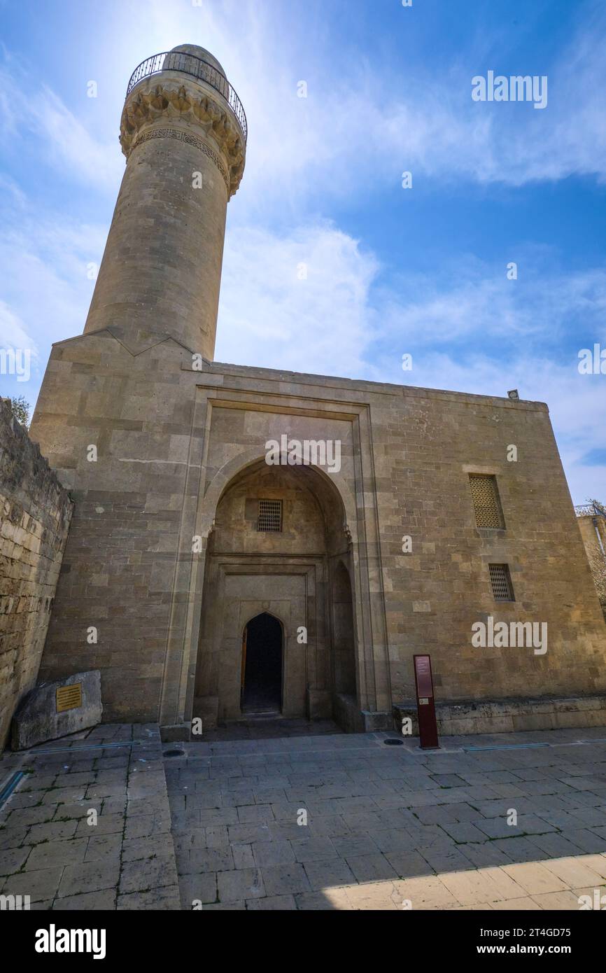 Exterior view of the Shah Mosque, Şah Məscidi and its minaret. At the Palace of the Shirvanshahs complex in the Old City section of Baku, Azerbaijan. Stock Photo