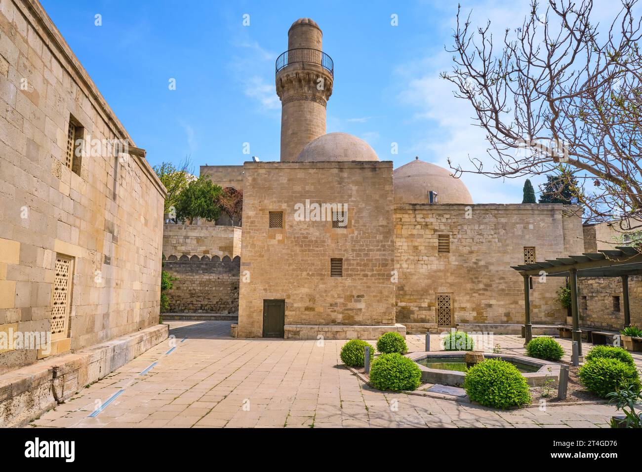 Exterior view of the Shah Mosque, Şah Məscidi and its minaret. At the Palace of the Shirvanshahs complex in the Old City section of Baku, Azerbaijan. Stock Photo