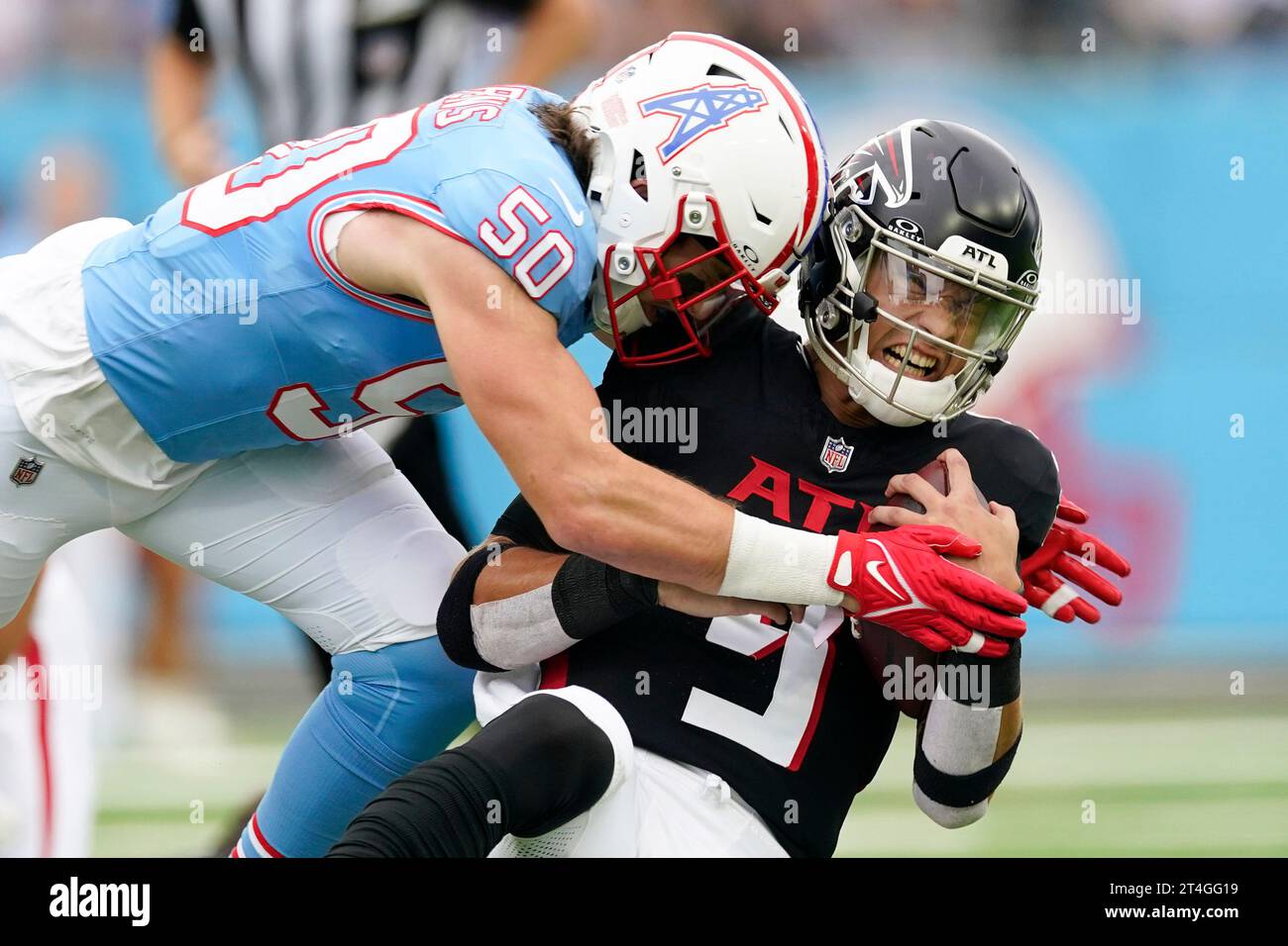 Tennessee Titans linebacker Jack Gibbens (50) tackles Atlanta Falcons