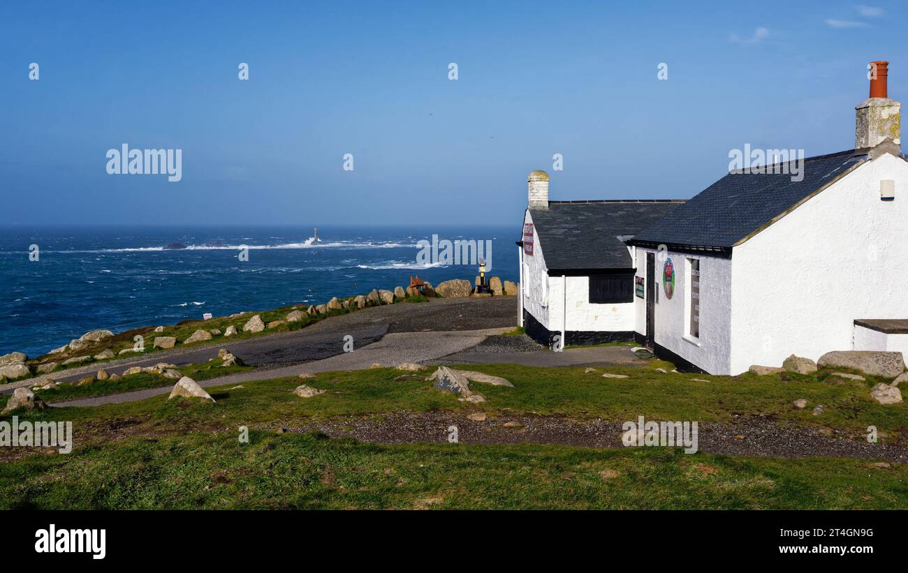 First and Last House with Longships Lighthouse, Land's End, Cornwall, UK Stock Photo