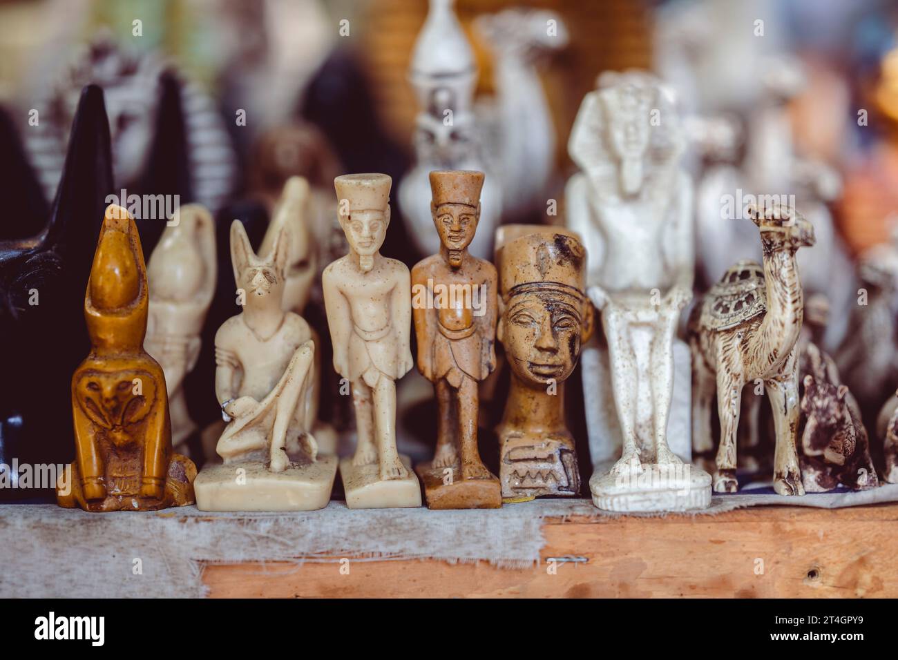 A close-up of Ancient Egyptian artifacts on pedestal platforms in Cairo ...