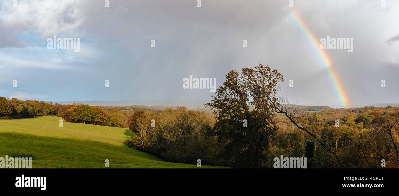 Rainbow over Brightling park on the high weald in east Sussex south east England UK Stock Photo