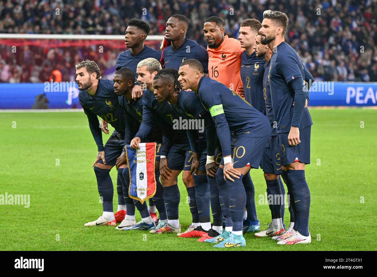 players of France with Aurelien Tchouameni (8) of France, Ibrahima Konate (13) of France, Goalkeeper Mike Maignan (16) of France, Benjamin Pavard (2) of France, Jonathan Clauss (3) of France, Olivier Giroud (9) of France, Theo Hernandez (22) of France, Ousmane Dembele (11) of France, Antoine Griezmann (7) of France, Eduardo Camavinga (6) of France and Kylian Mbappe (10) of France pose for a team photo during a soccer game between the national teams of France and Scotland in friendly game, on October 17, 2023 in Lille, France. (Photo by David Catry/Sportpix) Stock Photo