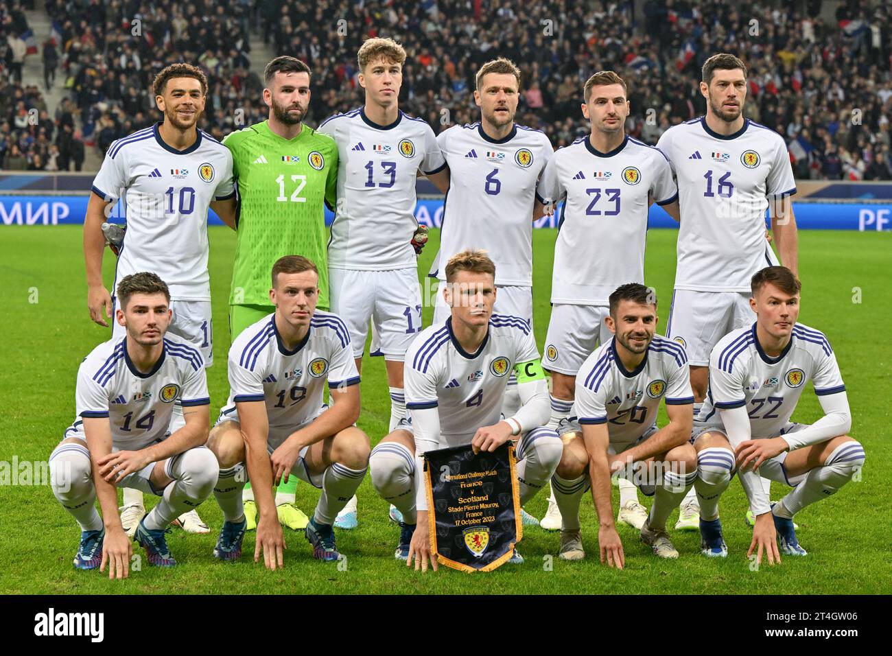 players of Scotland with Che Adams (10) of Scotland, goalkeeper Liam Kelly (12) of Scotland, Jack Hendry (13) of Scotland, Liam Cooper (6) of Scotland, Kenny McLean (23) of Scotland, Scott McKenna (16) of Scotland, Billy Gilmour (14) of Scotland, Lewis Ferguson (19) of Scotland, Scott McTominay (4) of Scotland, Greg Taylor (20) of Scotland and Nathan Patterson (22) of Scotland pose for a team photo during a soccer game between the national teams of France and Scotland in friendly game, on October 17, 2023 in Lille, France. (Photo by David Catry/Sportpix) Stock Photo