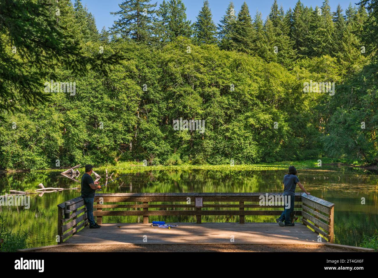 Anglers at fishing platform at Hebo Lake Campground, Siuslaw National Forest, Oregon Coast Range