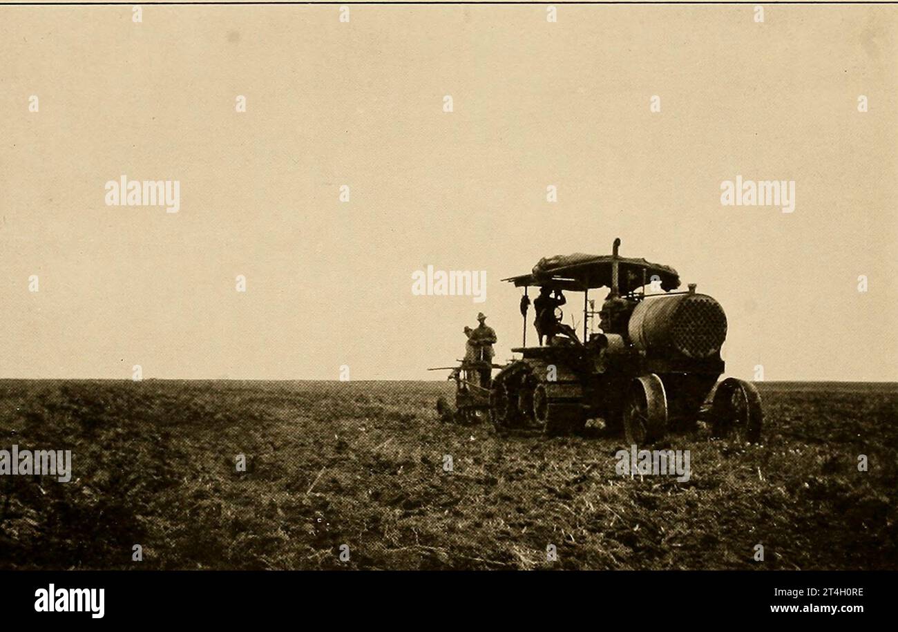 Tractor at Work on the Prairie from the book Texas, the marvellous, the state of the six flags; by Nevin Otto Winter Published The Page company 1916 ,Including Accounts of the Spanish Settlement and Establishment of the Indian Missions; the Unfortunate Expedition and Death of La Salle ; the Romance of its Early Settlement and Stories of its Hardy Pioneers ; the Nine-year Republic of Texas ; Stephen F. Austin and Sam Houston ; 'Remember the Alamo'; the Development of the Cattle Ranches ; the Great Ranches and a Visit to a Million-acre Ranch ; the Growing Cities; the Rehabilitation of Galveston; Stock Photo