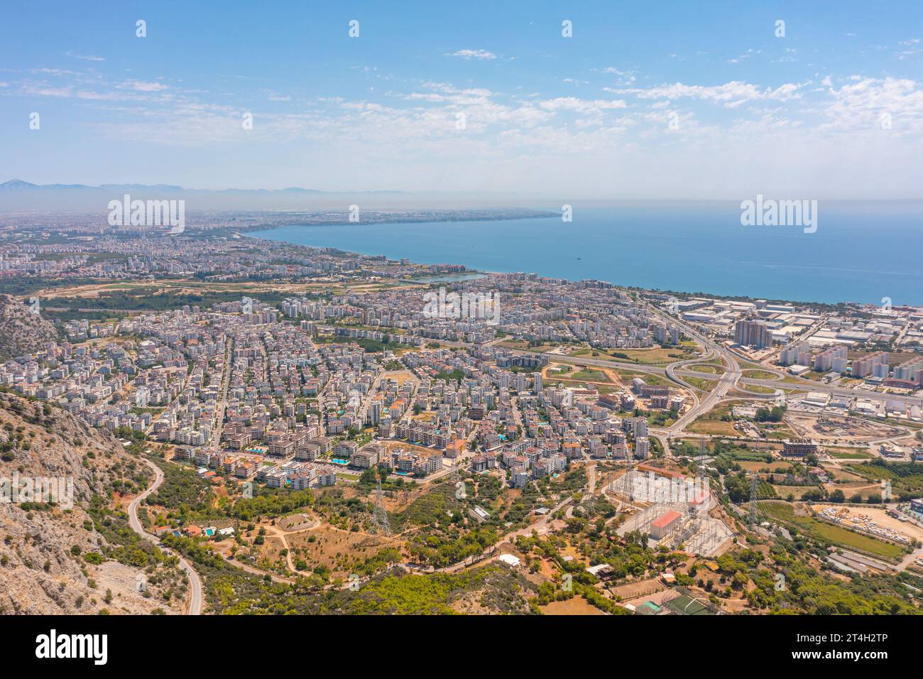 Flight over ridge mountain pass rocky terrain with bushes, bird's eye ...