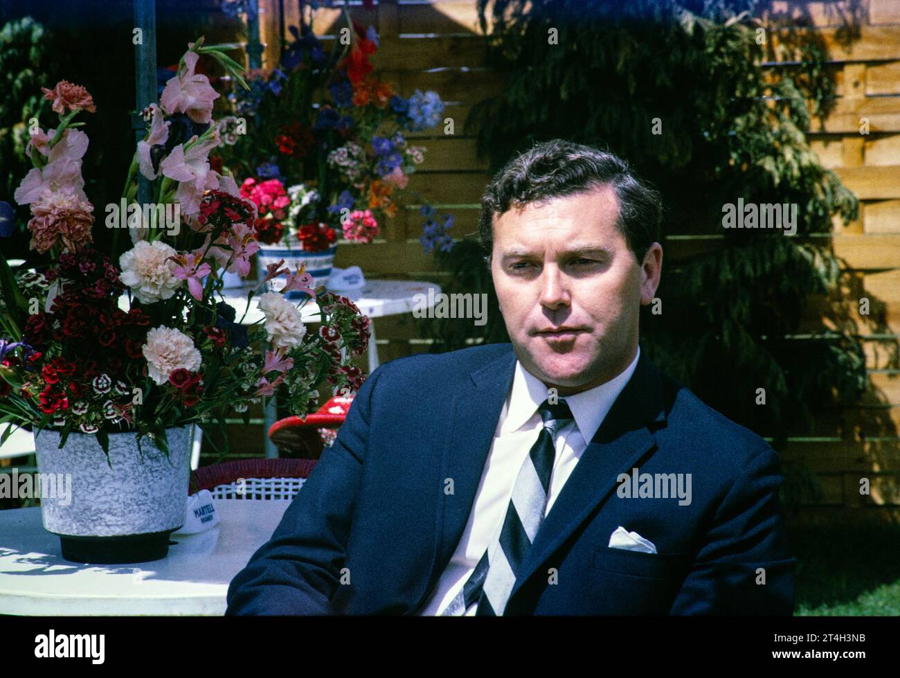 ATV television ITV outside broadcast, Wimbledon tennis tournament, England, UK 1967 portrait of sports presenter Dickie Davies photo by Alan 'Taffy' Harries Stock Photo