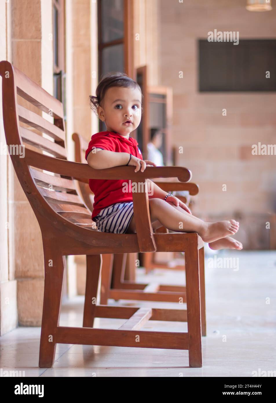 Indian boy sitting chair barefoot hi-res stock photography and images ...