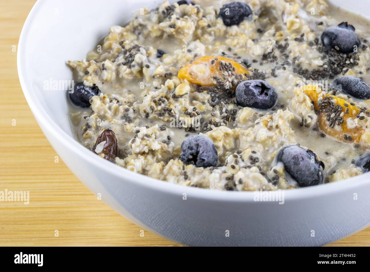 Overnight oats with chia seeds and blueberries Stock Photo Alamy