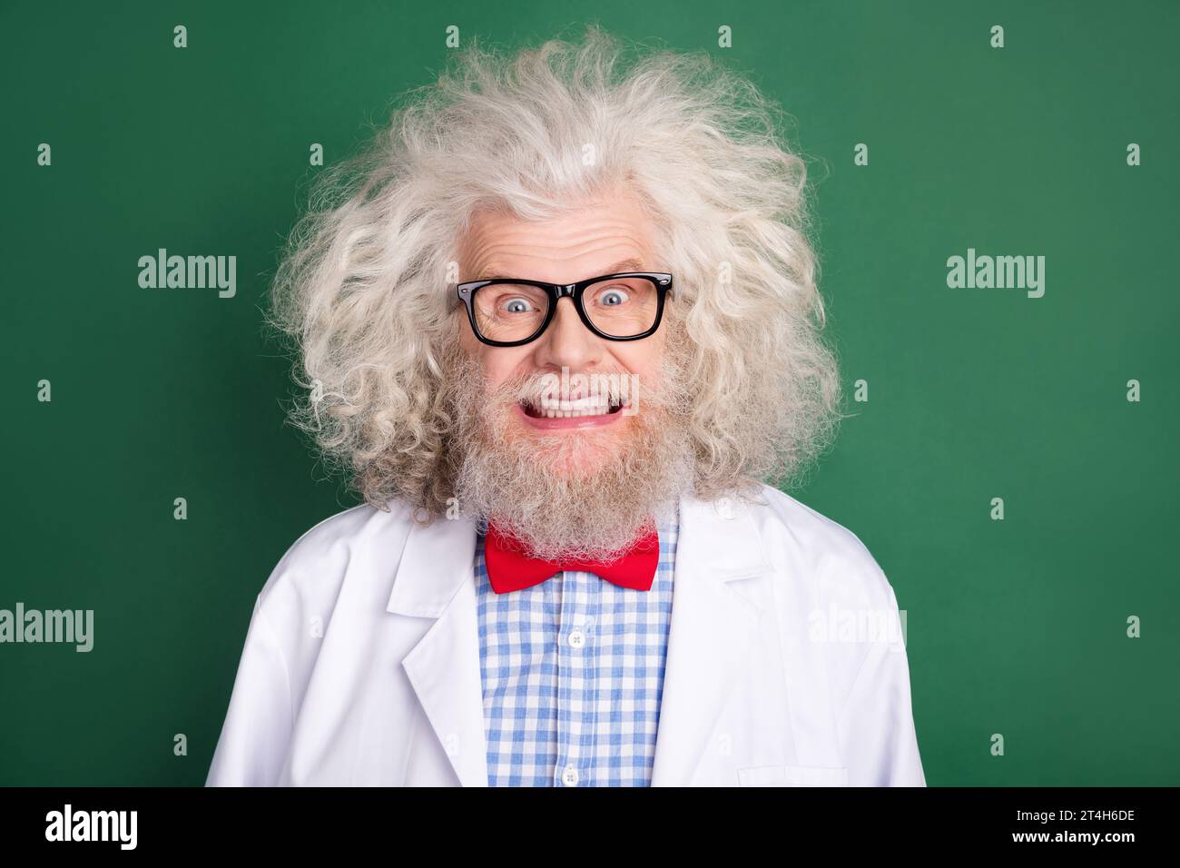 Portrait of excited positive person toothy smile have great solution isolated on dark green color background Stock Photo