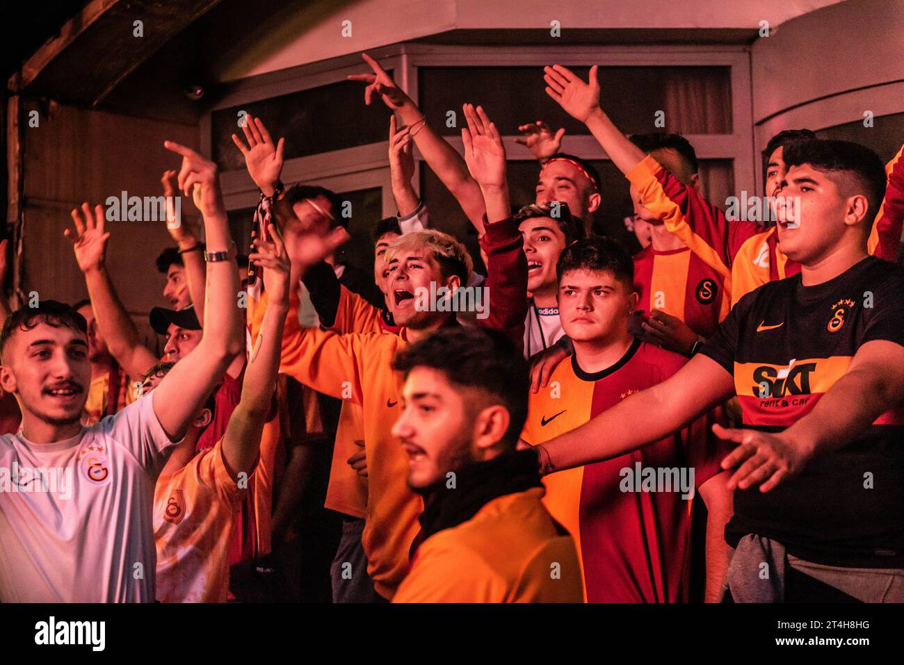 Istanbul, Turkey. October 24th 2023 Galatasaray football fans singing and chanting songs before the Champions League match against FC Bayern Munich. N Stock Photo