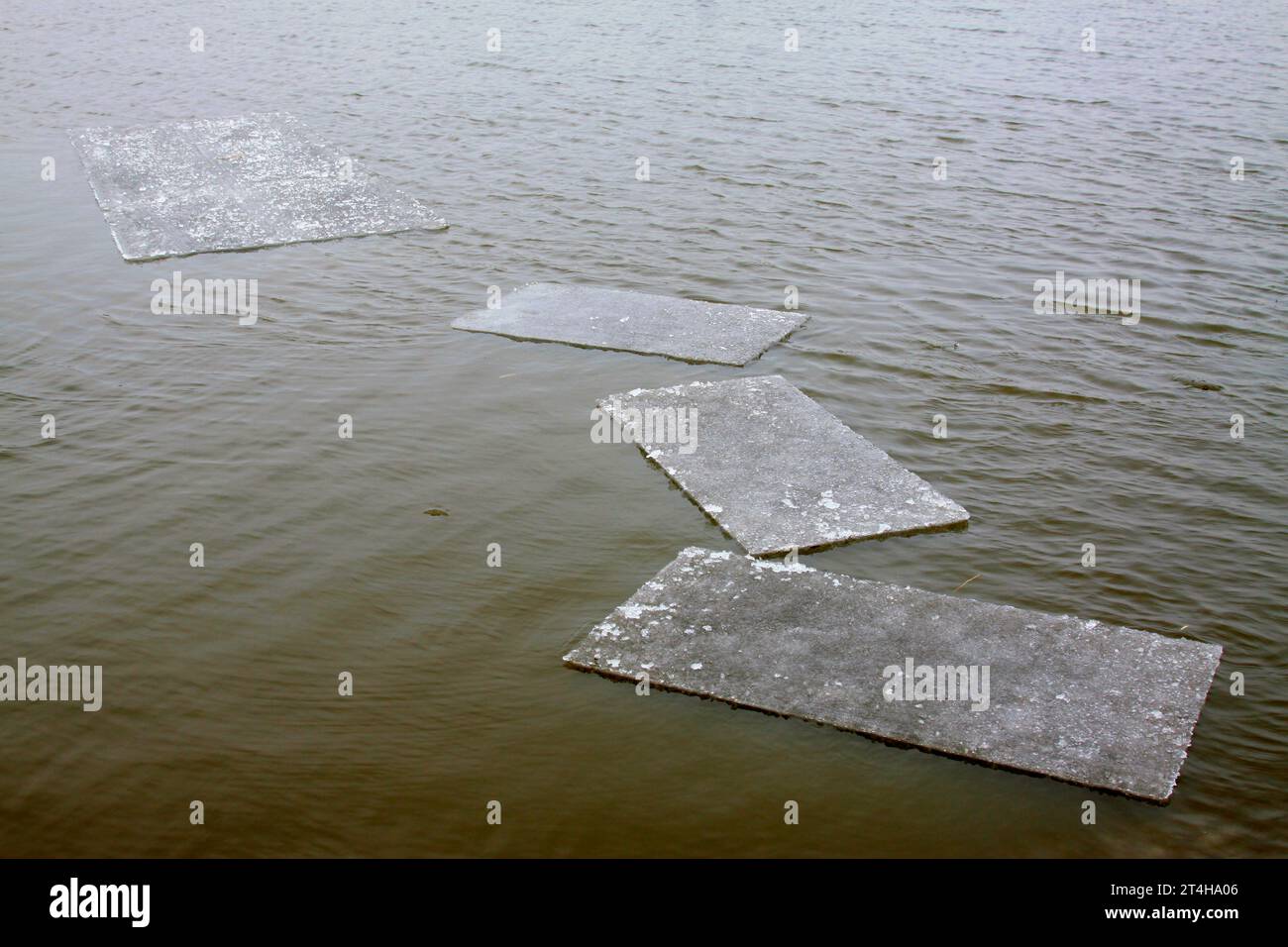 Rectangular ice floating on the water, closeup of photo Stock Photo - Alamy