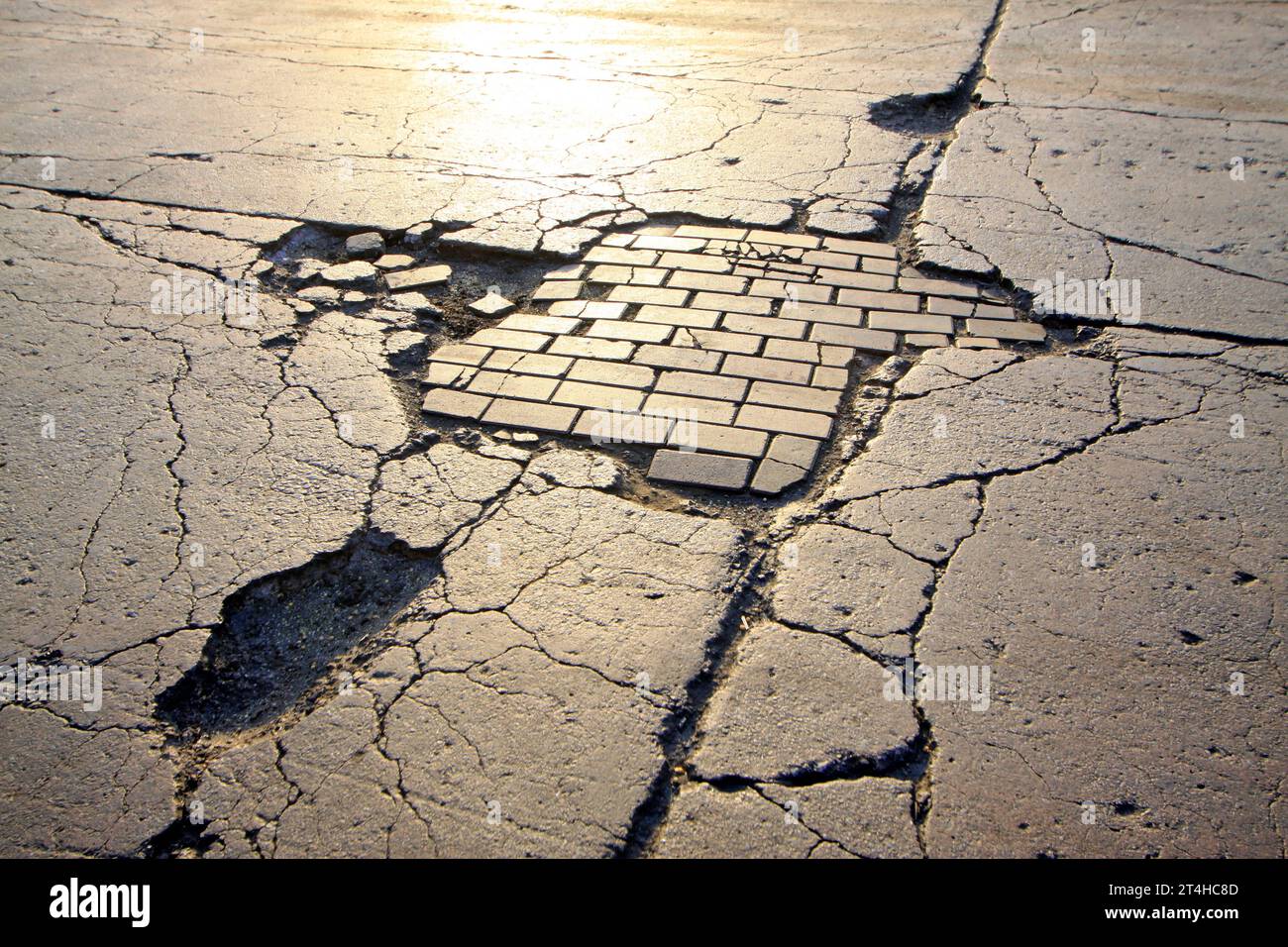 Broken asphalt pavement hi-res stock photography and images - Alamy