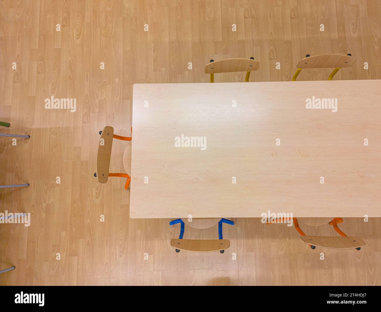 Aerial view of a school classroom, with brown chairs and tables Stock Photo