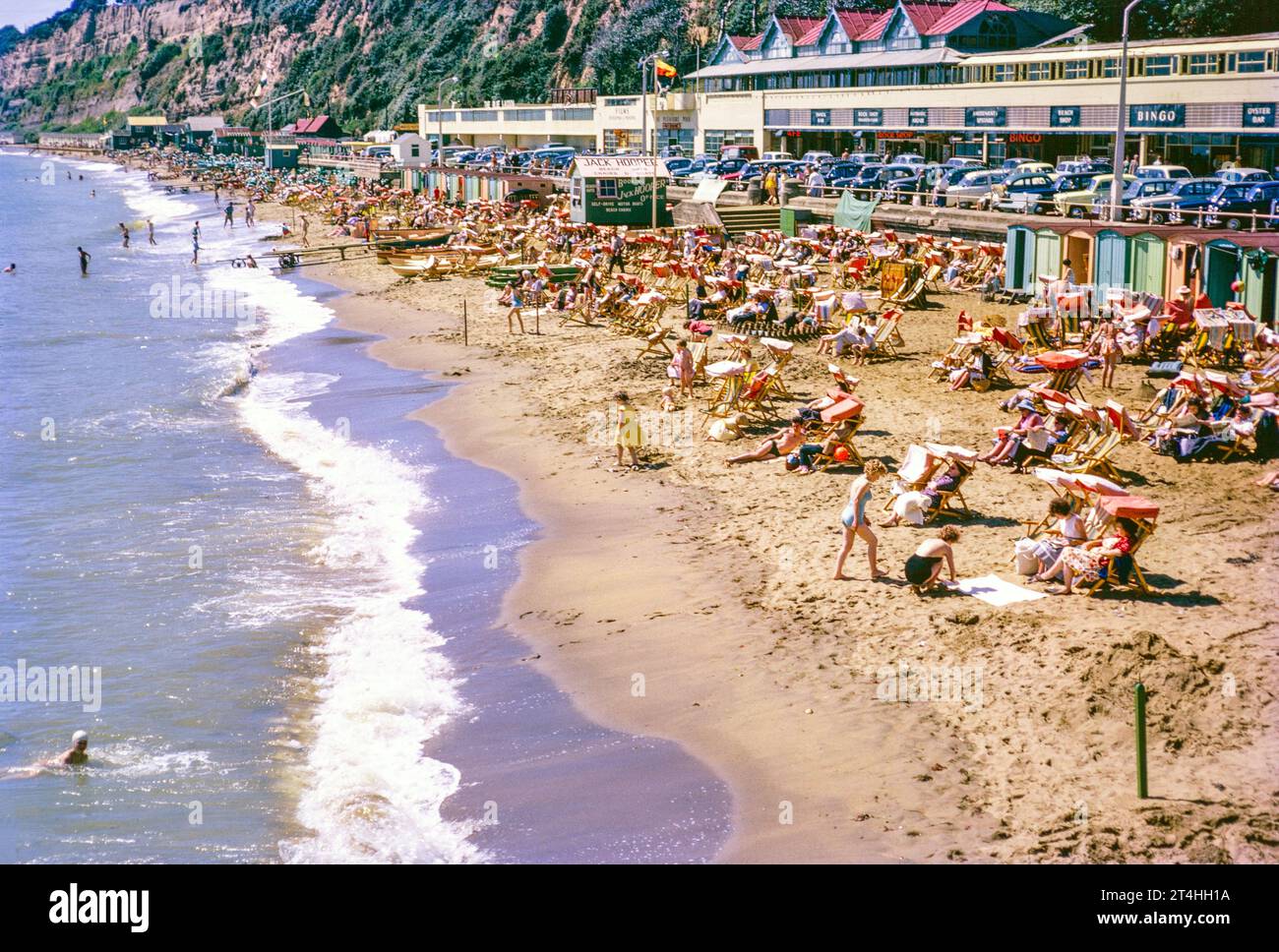 Crowds of holidaymakers on Sandown beach, Isle of Wight, England, UK 1960s Stock Photo