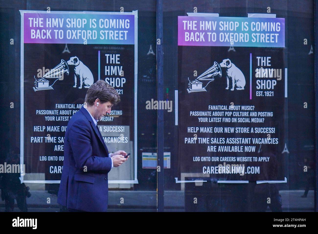 London, UK. 31 October 2023.  Posters announce the return HMV flagship Store in  Oxford Street which will replace the American Candy store on the  original site.  HMV was bought by Sunrise Records which  will open in time for Christmas with fresh branding and a new layout .Credit amer ghazzal/Alamy Live News Stock Photo