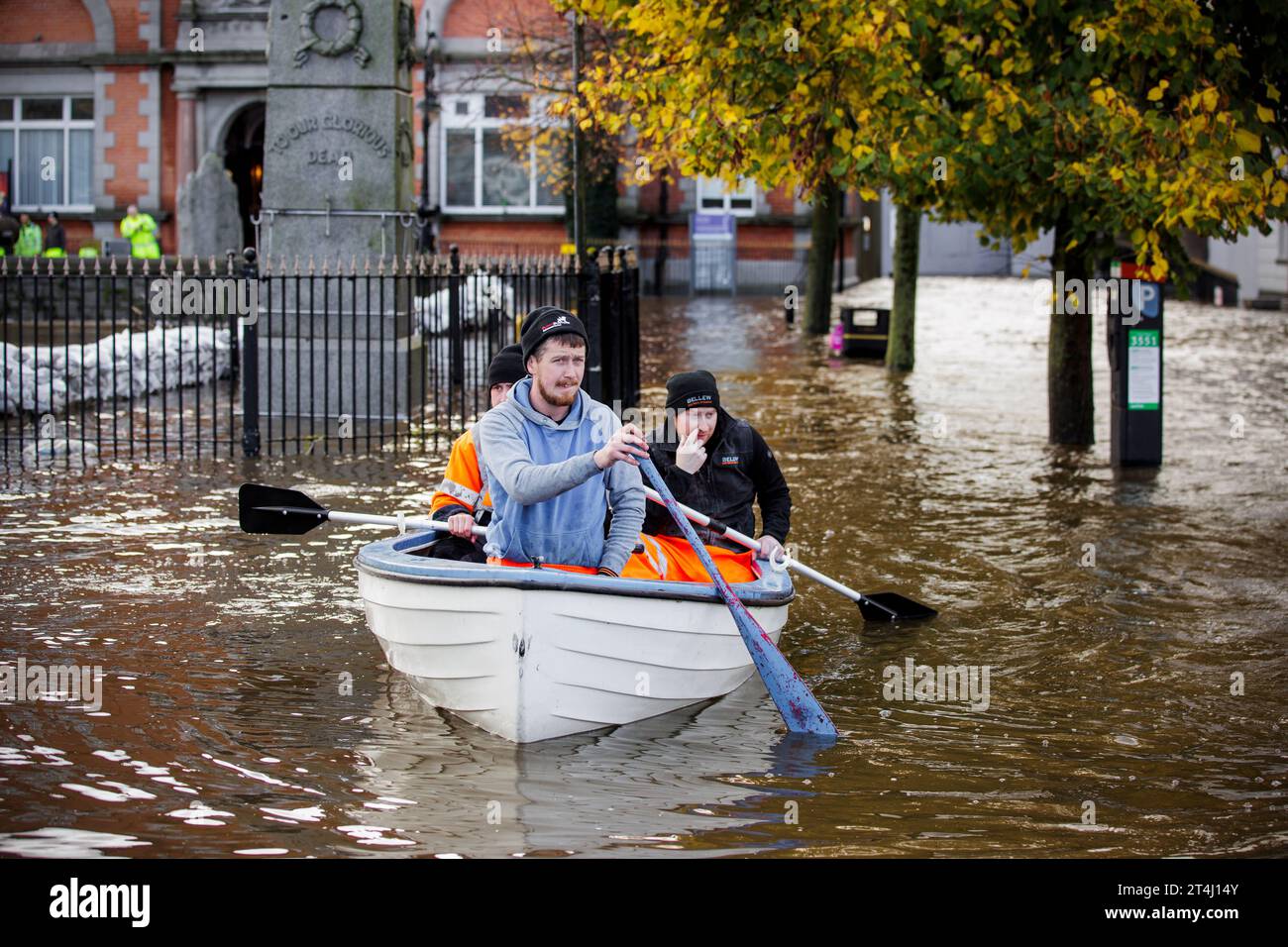 People canoe down a flooded Bank Parade in Newry Town, Co Down